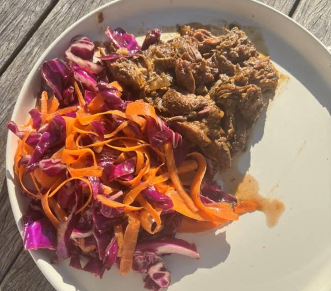 bison chuck roast recipe slow cooker with colorful carror asian salad